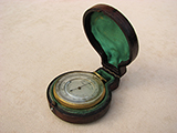 19th century pocket barometer & altimeter with curved thermometer.